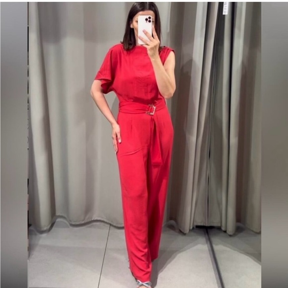 ASYMMETRIC CREPE BUCKLE JUMPSUIT
RED / CORAL . SIZE M, L - Picture 3 of 16